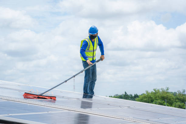 istock Technicians are cleaning solar panel,Clean solar panel in solar power plant. 1428553233