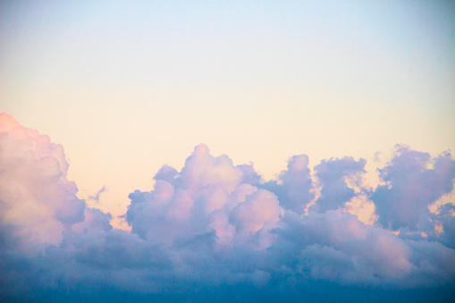 Pastel colors of clouds and sky looks like cotton candy