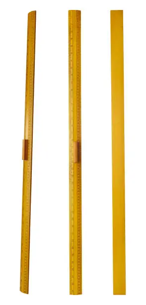 Yellow wooden long ruler isolated on white background