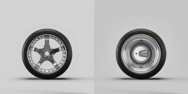 istock Car wheels on white background. Isolated car tires with shiny rim from front view. 3d rendering 1428565737
