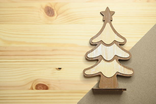 istock wooden christmas tree on table, celebration design 1428567209