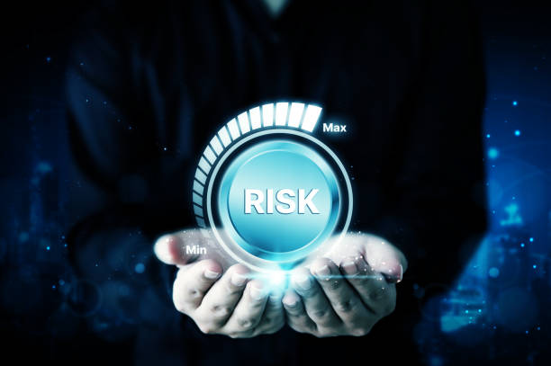 istock Risk management business strategy planning concept. Businessman hand holding risk level 1428571649
