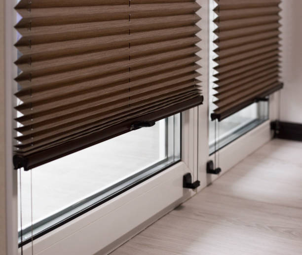 istock Pleated blinds close up on the window 1428572439