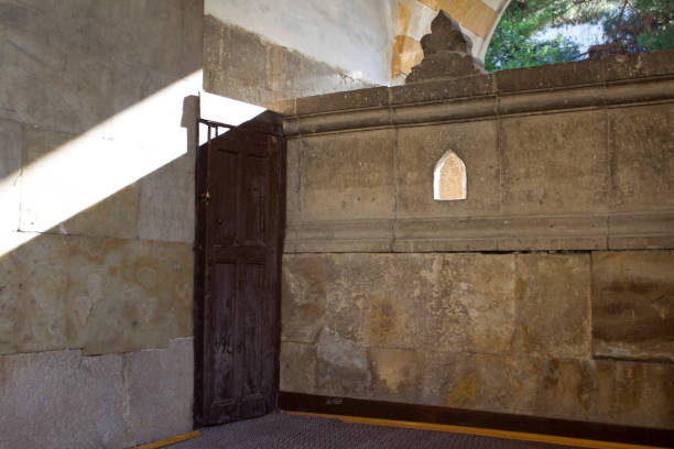 istock Ancient stone structure wooden gate entrance 1428575908