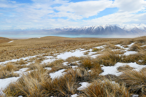 The Southern Alps viewed from Round Hill ski field on the eastern side of Lake Pukaki.  This image was taken on a windy, cold and sunny afternoon in early Spring.