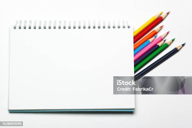 https://media.istockphoto.com/id/1428593595/photo/blank-notepad-and-pencil-color-on-a-table-blackground.jpg?s=612x612&w=is&k=20&c=GkDl_B83hU3mfP47ssH7icMTFKR81u3mdsFa_NX6jxY=