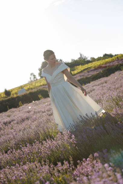 istock Beautiful young bride in lavender field 1428598691