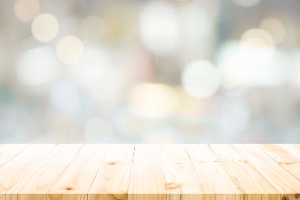 istock Empty wooden table for present product on bokeh blur background image. 1428598956
