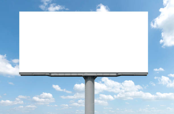 istock Outdoor pole billboard with mock up white screen on blue sky background with clipping path 1428604879