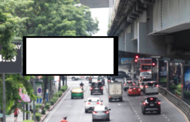 LED display road sign with mock up white screen on highway road and clipping path