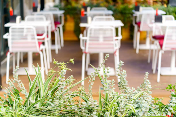 Summer cafe on the street. Tables and chairs without people.