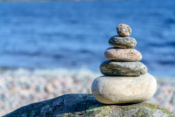 istock Pyramid of stones. Unstable balance of stone objects. 1428608957