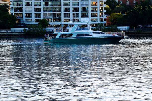 Boat on the Brisbane River at Teneriffe, Queensland (view from Bulimba Riverside Park)
