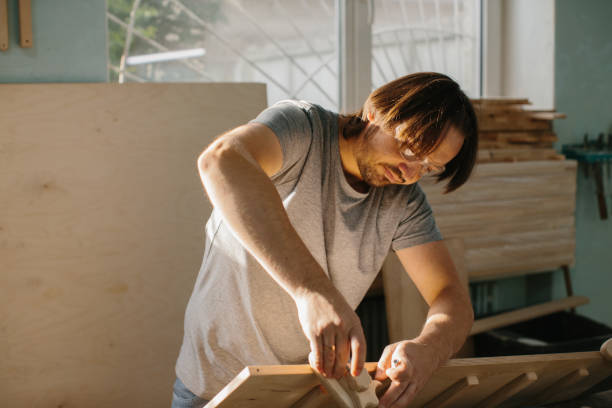 istock A carpenter makes a Montessori climbing set for children in his workshop. 1428610978