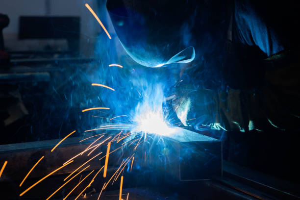 istock Steel worker grinding metal in a workshop. 1428611092