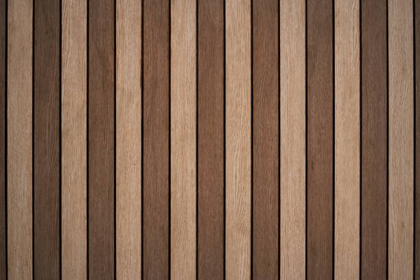 istock Arranged pattern  brown wooden planks board background makes you feel warm and natural. 1428614852