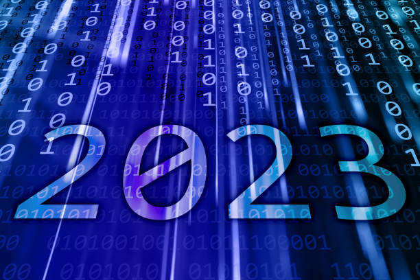 New Year 2023 on a binary code background stock photo