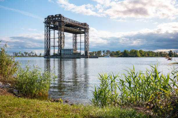 View over the Peenestrom to the lift bridge in Karnin on the island of Usedom in Mecklenburg-Western Pomerania in autumn during the day.