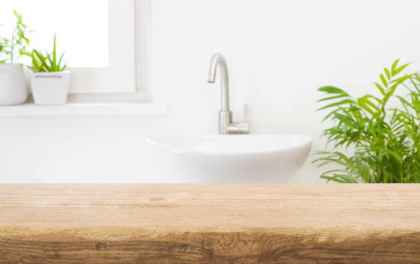 istock Table top for product display and blurred bathroom washstand background 1428623521