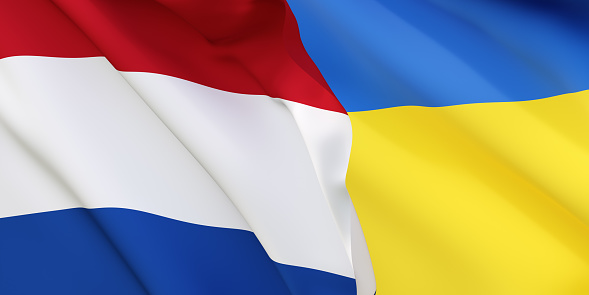 Dutch and Ukrainian flags flying in the wind. Netherlands stand with Ukraine. 3D rendered image.