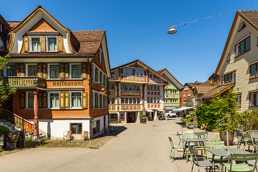 Appenzell, Canton Appenzell Innerrhoden, Switzerland - June 14, 2022. The Swiss village of Appenzell is well-known for its colorful painted wooden houses.