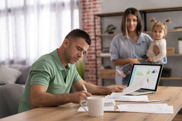 istock Men doing online learning on a laptop while staying at home. 1428625865