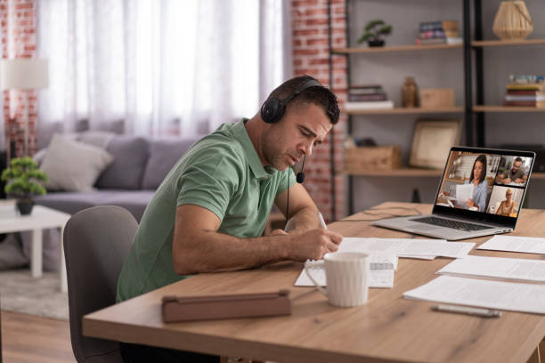 istock Men doing online learning on a laptop while staying at home. 1428625878