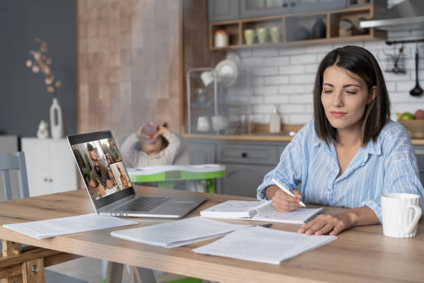 istock Women doing online learning on a laptop while staying at home. 1428625945