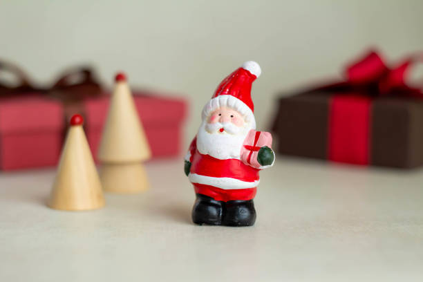 istock Santa Claus doll with gifts 1428628106