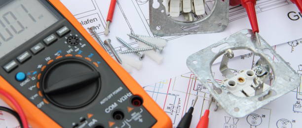 istock Screwdriver and socket on a wiring diagram 1428629946