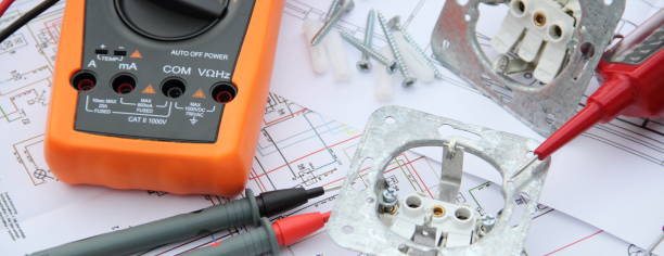 istock Screwdriver and socket on a wiring diagram 1428629947