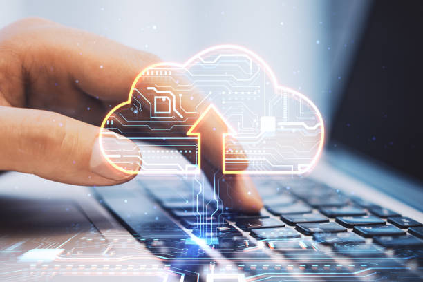 istock Cloud service and technologies concept with digital cloud symbol with arrow and circuit inside on human fingers typing on modern laptop keyboard background, double exposure 1428632385