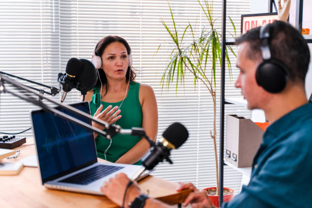 istock interview and discussion between a blogger and a guest on a live podcast show 1428634997
