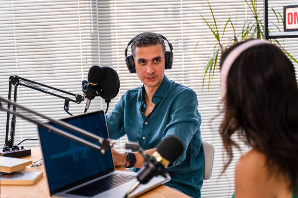 istock interview and discussion between a blogger and a guest on a live podcast show 1428635184