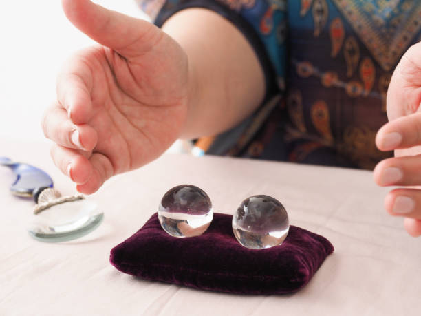 istock woman fortune telling with crystal 1428636063