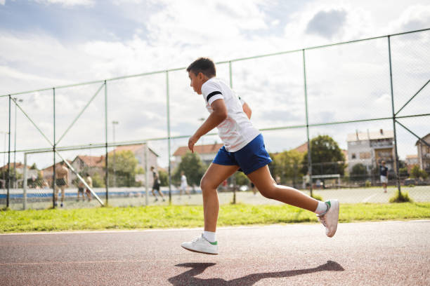 istock Boy running on the track in the city. 1428637162