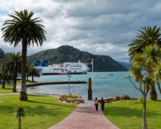Inter island Cook Strait ferry terminal with Interislander ferry, Aotearoa / New Zealand. Picton, Marlborough Sounds / Aotearoa / New Zealand - September 20, 2022: Inter island Cook Strait ferry terminal with Interislander ferry viewed from Picton waterfront. picton new zealand stock pictures, royalty-free photos & images