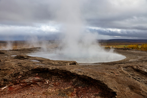 Geysir hot spring in the geothermal area of Haukadalur Valley, south-west Iceland