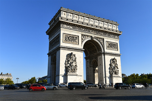 Paris, France-09 21 2022: The Arc de Triomphe in Paris, is the most monumental of all triumphal arches, was built between 1806 and 1836, it's standing at the western end of the Champs-Élysées at the center of Place Charles de Gaulle, formerly named Place de l'Étoile.
