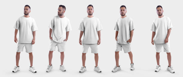 istock Oversized white suit mockup, men's t-shirt, shorts on a guy in sneakers, for design, print, pattern. 1428646748
