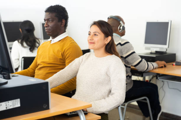 istock Hispanic woman and african american man studying in computer library 1428647240