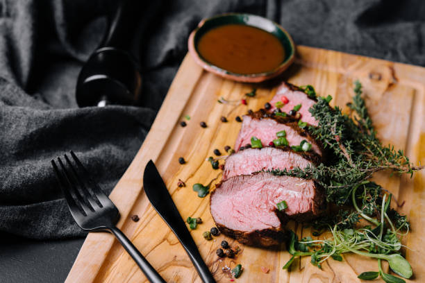 Roasted duck magret with barbecue sauce stock photo