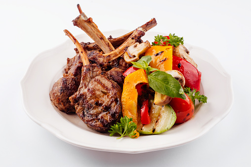 Grilled lamb rack with baked vegetables