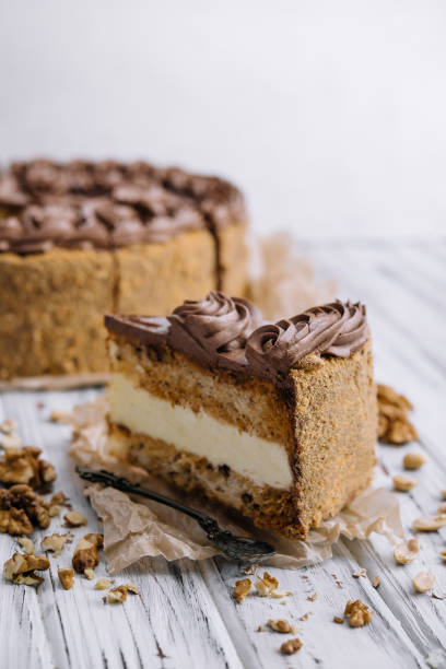 istock Chocolate, caramel, peanut cake on wood 1428656396
