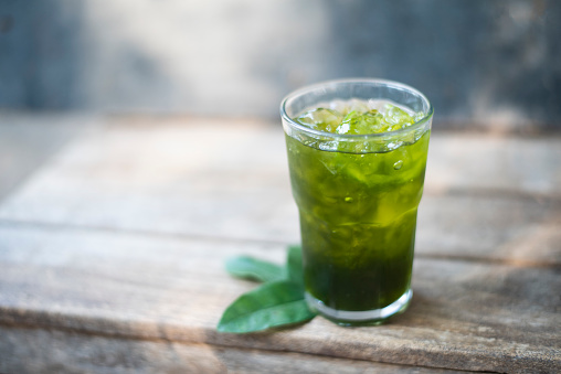 Green Tiliacora Juice in glass.Herb soft drink concetp.