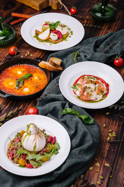 istock different types of italian dishes on a large wooden table 1428662394