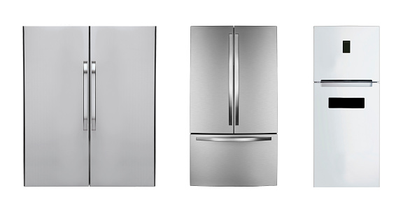 three stainless steel refrigerators isolated on white
