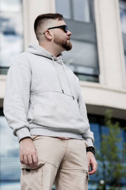 istock stylish bearded man in a grey hoodie 1428670542