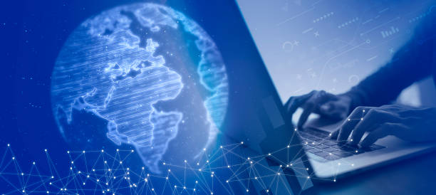 istock Businessman using laptop with abstract world and background geometric with polygon lines and dots for Science and business technology. Connection triangle structure. 1428671030