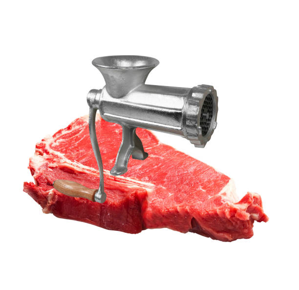 istock Classic meat grinder isolated on meat 1428672644